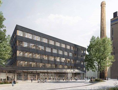 A Fribourg, le projet de développement du quartier d'innovation Blue Factory, avec ses façades en bois brûlé, garde la cheminée historique