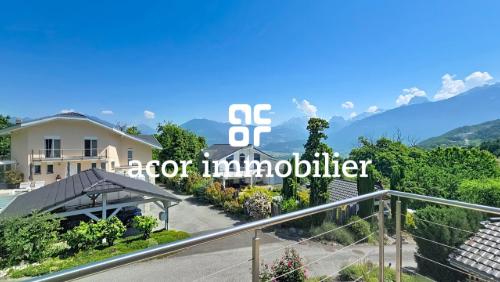 Villa aux volumes spectaculaires face aux Alpes — photo 5