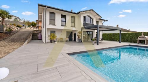 Villa avec piscine à Payerne