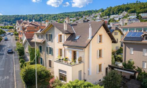 Une maison aux multiples possibilités - quartier agréable de Peseux