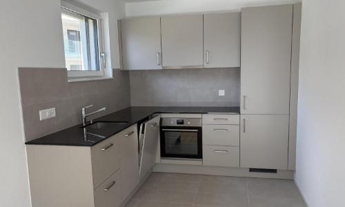 Magnifique appartement de 2.5 pièces au 1er étage d'un immeuble neuf avec balcon - E102 — photo 2