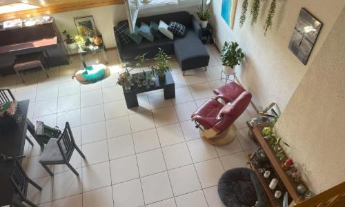 Duplex en attique au coeur de Bussigny dans un cadre verdoyant — photo 4