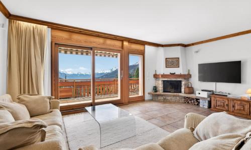 Appartement lumineux avec vue panoramique sur les Alpes et la plaine d