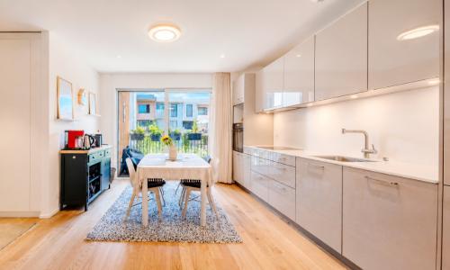 Appartement 3,5 pièces : L'élégance traversante au coeur d'Arbora — photo 4