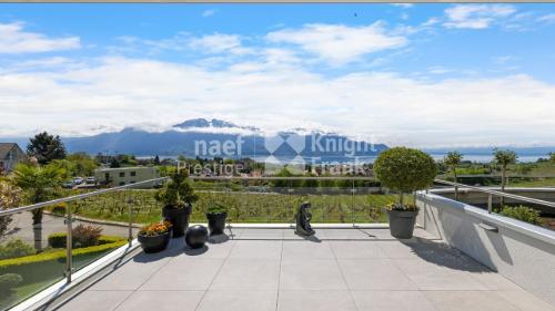 Maison jumelle de 7.5 pièces avec une vue panoramique sur le lac à vendre à Montreux