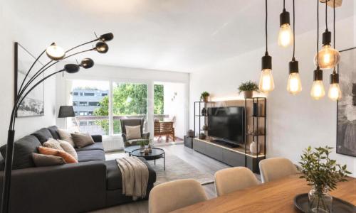 En Exclusivité : Spacieux 5 pièces rénové avec balcon et garage à Onex