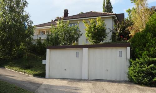 Élégante maison individuelle avec vue sur le lac et les Alpes à Auvernier