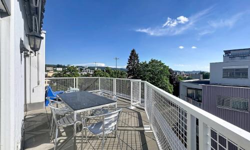 Appartement en attique de 5.5 pièces avec deux terrasses et deux balcons